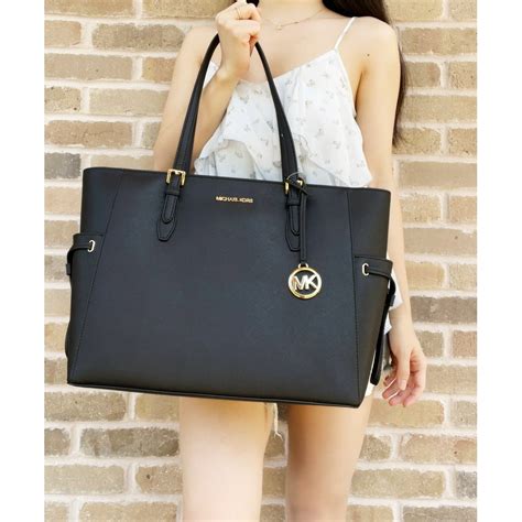 michael kors black drawstring handbag|Michael Kors saffiano tote large.